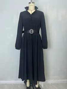 French-style black textured midi shirt dress with lapels and a matching buckled belt