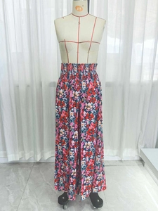 High-waisted floral wide-leg beach pants with vibrant multi-colored flower prints