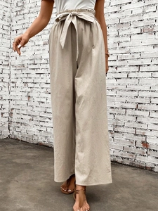 High-waist wide-leg cotton pants with paperbag waist and adjustable tie belt in beige
