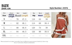 Detailed size chart for fringe strap top and shorts set with dimensions in centimeters
