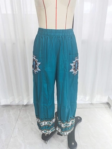 Pantaloni etnici boho a gamba larga color verde petrolio con stampa 3D e vita elastica