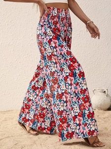Women's high-waisted floral wide-leg pants with smocked elastic waist for beach vacation