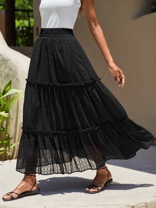Detail of high waist black Swiss dot tiered long skirt with ruffled chiffon fabric