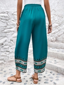 Pantaloni bohémien a gamba larga a vita alta turchese con stampa etnica e tasche