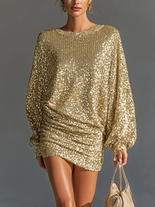 Golden sequin dress featuring long lantern sleeves and a ruched mini skirt for parties