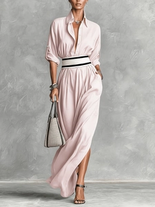 Pink shirt-collar long dress with striped belt and side slit for a retro French look