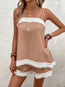 Women's two-piece bohemian beach set with tassel trim camisole and matching shorts