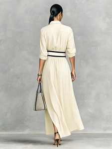Elegant beige long sleeve maxi dress with striped belt and high side slit back view