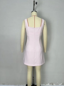 Pink sleeveless slim fit mini dress with back zipper and square neck on mannequin