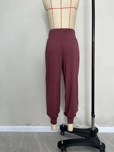 Women's high waist yoga joggers in burgundy with elastic ankle cuffs and soft fabric