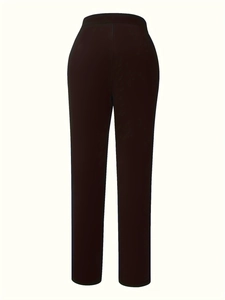 Detail of high-waisted straight trousers featuring a wide asymmetric waistband design