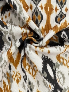Uitlopende broek met Azteekse print en split in hoogwaardige geribbelde gebreide stof