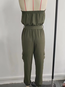 Back view of army green strapless jumpsuit with cargo pockets and cinched waist