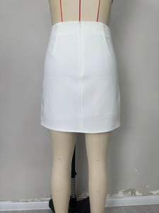 Detailed rear view of high-waist white mini skirt with invisible zipper and darts