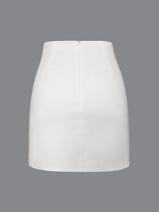 Rear view detail of a high-waisted white A-line skirt with an invisible back zipper