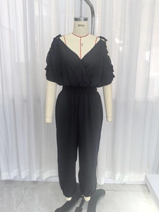 Elegant black V-neck jumpsuit with ruffled short sleeves and an elastic gathered waistline