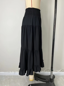 Jupe longue noire à taille haute pour femmes avec volants et taille élastiquée