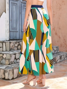 Pantaloni da donna a vita alta con gamba larga e stampa geometrica colorata in tessuto fluido
