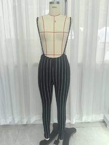 Vertical black and white striped slim-fit overalls for women with thin shoulder straps