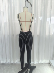 Chic black and white vertical striped high waist jumpsuit with back thin straps