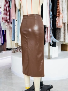 Detailed back view of a slim fit brown PU leather midi skirt with high waist and invisible zipper