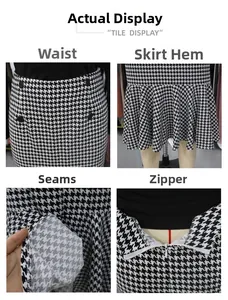 Detail showing houndstooth texture, gold buttons, fishtail hem and hidden zipper closure