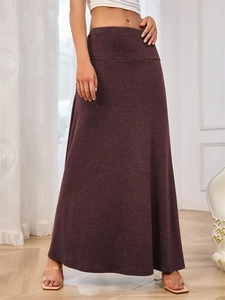 Detailed texture of the dark purple knitted high waist maxi A-line skirt fabric