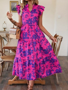 Robe longue fuchsia à fleurs avec volants et jupe à plusieurs niveaux pour les vacances