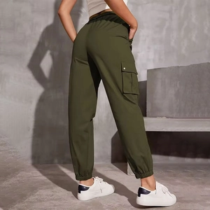 Detail of high waist military green cargo joggers with large side flap pocket for women