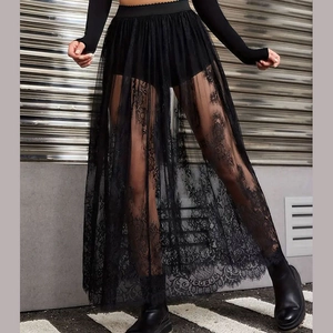 Detail of gothic black sheer lace skirt showing intricate floral embroidery and texture