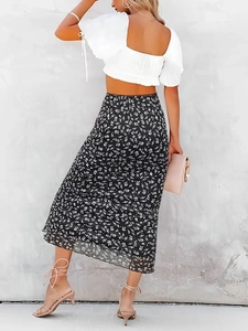Floral print high waist midi skirt in black chiffon with delicate white flower patterns