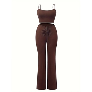 Detail view of chocolate brown crop top and ruched drawstring flare pants set