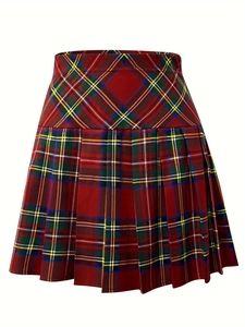 Detail of red high-waisted pleated skirt featuring a classic plaid tartan pattern