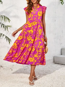 Longue robe fleurie sans manches avec volants superposés et col en V pour les vacances