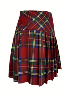Detail of red tartan pleated skirt featuring high waist and classic Scottish pattern fabric