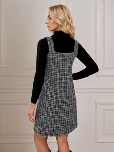Detail view showing back design of tweed houndstooth pinafore dress with turtleneck top