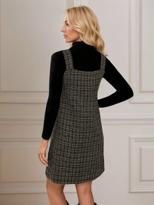 Detail of tweed houndstooth pinafore dress with back view of high neck knit top