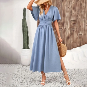 Detail view of light blue maxi dress with ruffle sleeves, v-neck and high side slit