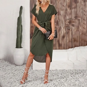 Detail of army green wrap dress showing V-neck, short sleeves, and waist tie design