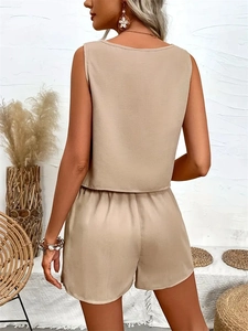 Women's summer khaki two-piece set featuring sleeveless bow-back top and casual shorts