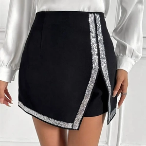 Close-up of black high-waist skort featuring sparkling silver sequin trim detail