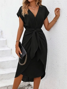 Elegant black short sleeve wrap dress with waist tie and irregular slit hem in solid color