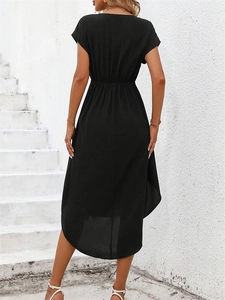 Back view of a black short-sleeved dress with elastic waist and irregular hemline