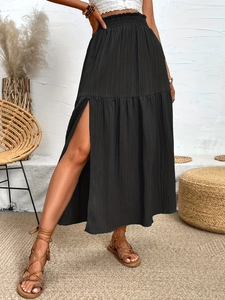 Elegant high waist black maxi skirt with side slit and ruffled texture for summer style