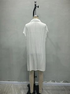 White sleeveless long beach cover-up shirt dress with side slits on a mannequin back view