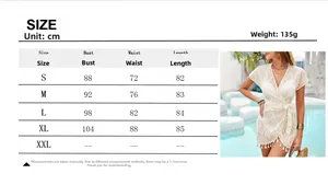 Detailed size chart table for white chiffon jacquard beach dress with tassel hem details