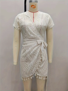White sheer chiffon jacquard short sleeve wrap dress with waist tie and fringe trim detail
