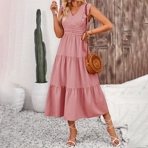Detail of dusty pink tiered maxi dress with v-neck, ruffles and smocked waist design