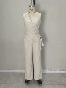 Women's chic beige vest and trousers suit set with asymmetrical button design