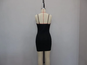 Close-up back view of a slim fit black mini dress with delicate spaghetti straps